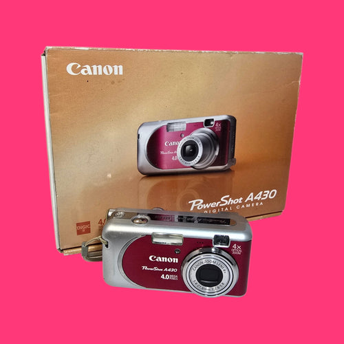 CAMARA DE FOTOS DIGITAL A PILAS CANON POWER SHOT A430 ROSA Y PLATEADA EN CAJA